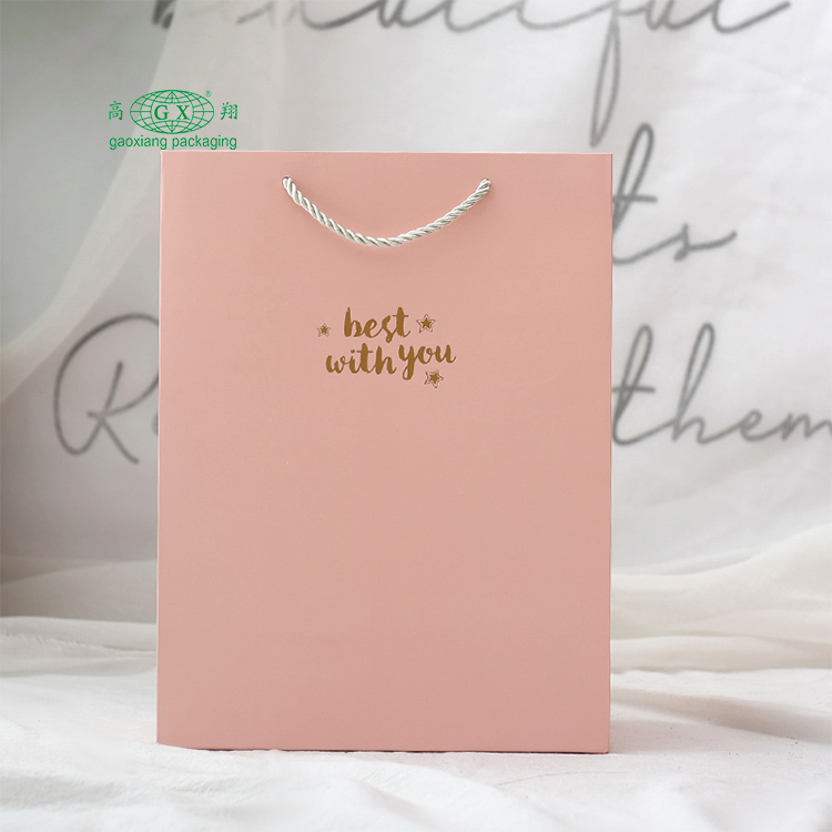 Großhandel benutzerdefinierte rosa schwarz weiß Luxus Kraftpapier Einkaufstaschen mit Logo