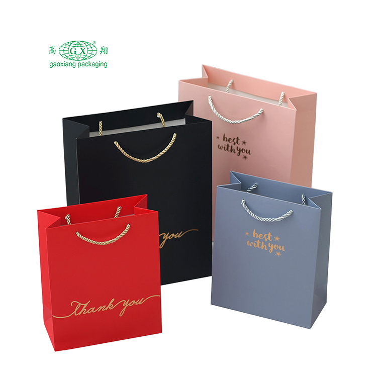 Großhandel benutzerdefinierte rosa schwarz weiß Luxus Kraftpapier Einkaufstaschen mit Logo